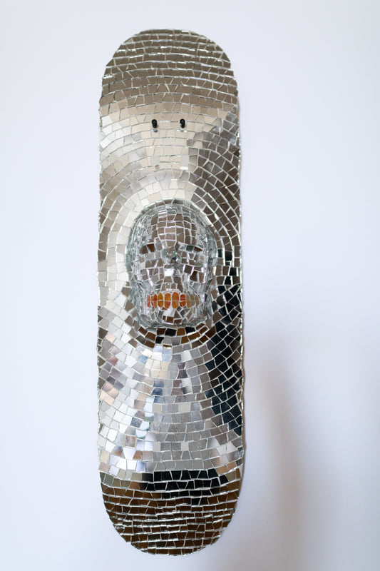 Gauli Mora, The Death, sculpture, 2023, glass on skate deck, 30x8"
