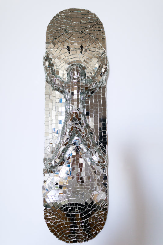 Gauli Mora, The Body, sculpture, 2024, glass on skate deck, 30x8"