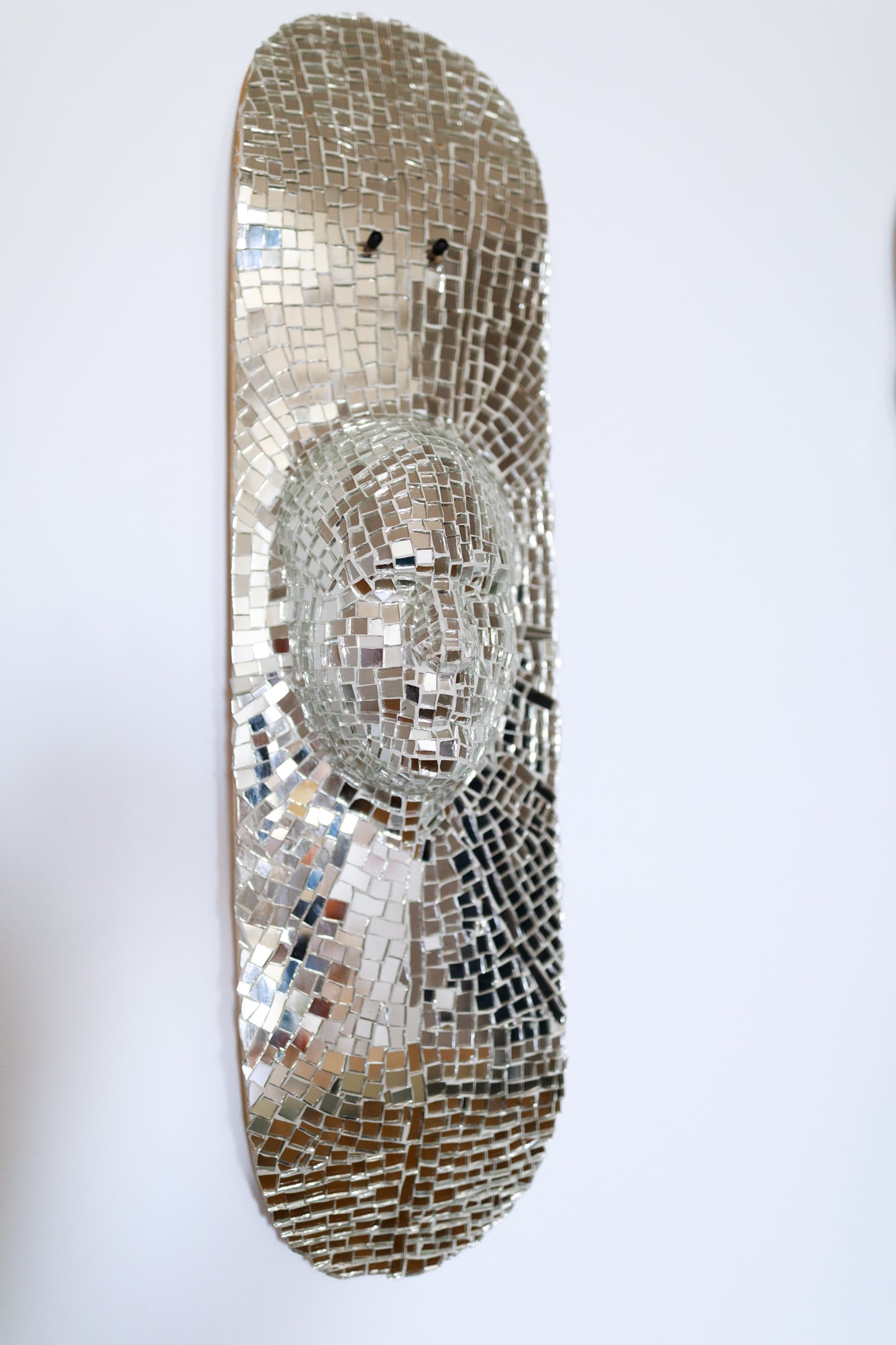 Gauli Mora, The Soul, sculpture, 2024, glass on skate deck, 30x8"